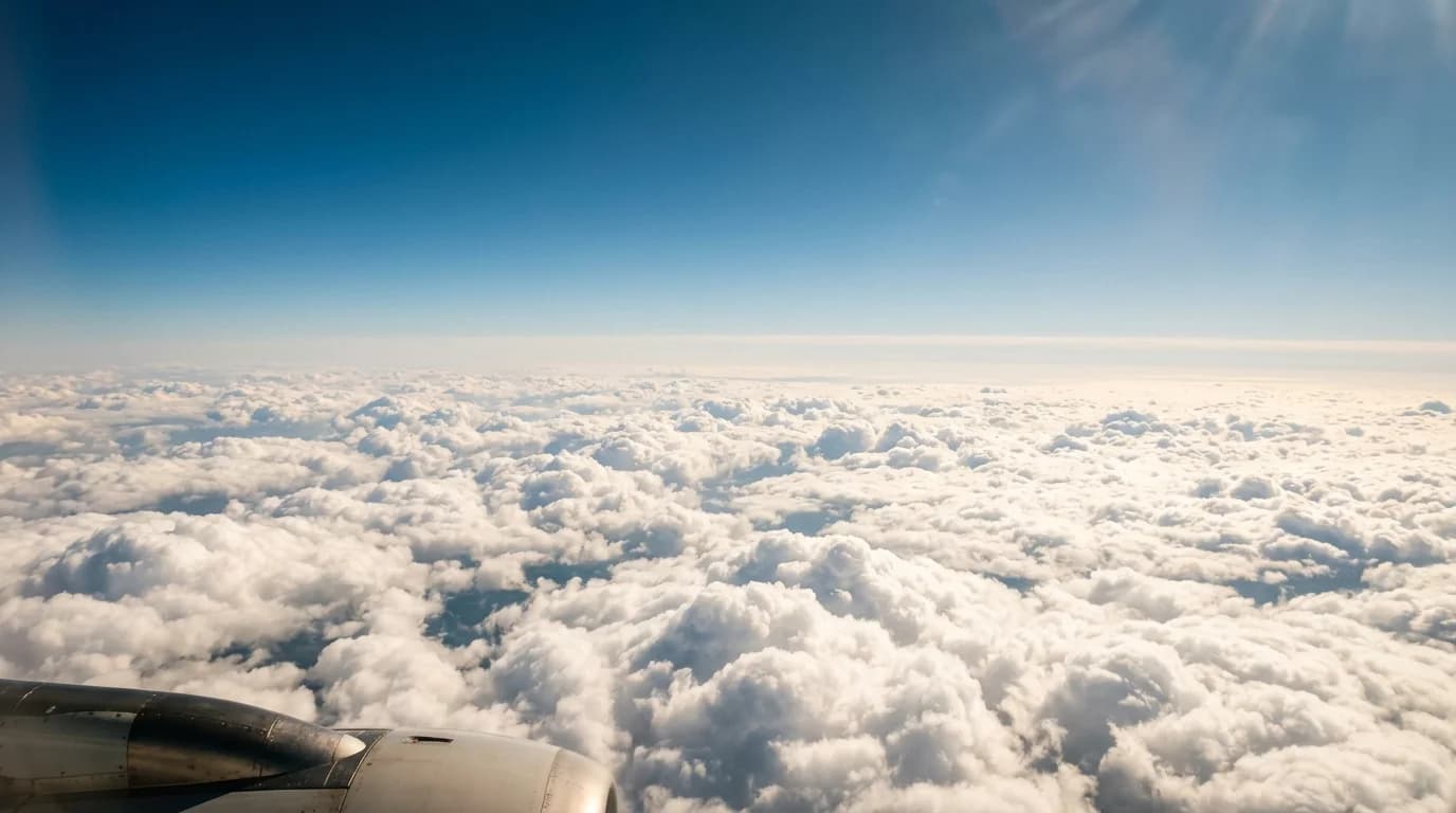 Serene view above the clouds at cruise altitude